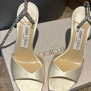 Jimmy Choo Elegant Cream Heels with Silver Accents only been worn one time